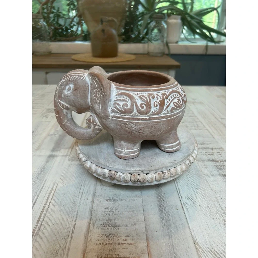 Terracotta white washed elephant‎ planter.